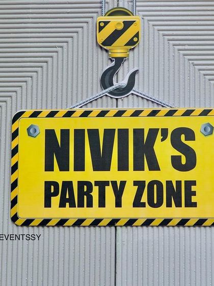 A custom 'Party Zone' sign, styled like a real construction warning, adds an authentic touch.