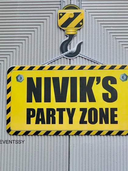 A custom 'Party Zone' sign, styled like a real construction warning, adds an authentic touch.