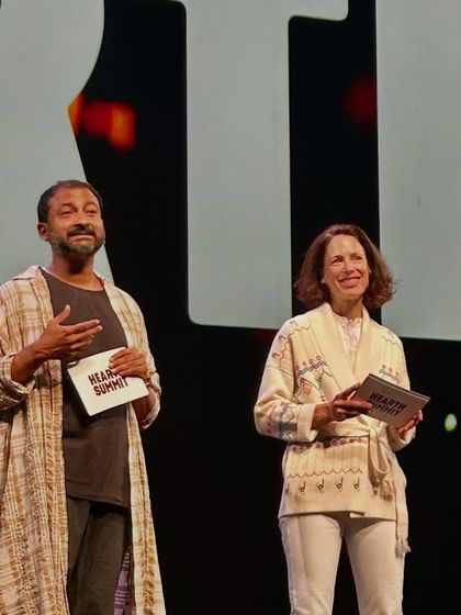A series of images and graphics from the Hearth Summit, showcasing speakers, panel discussions, and the core mission of the global wellbeing project.