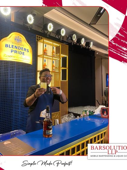 A toast to a successful evening. Our bartender presents a finished cocktail at the stylish Blender's Pride bar.