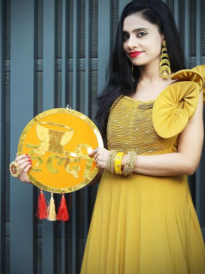 A close-up of the Haldi gown, showing the delicate embroidery on the bodice.