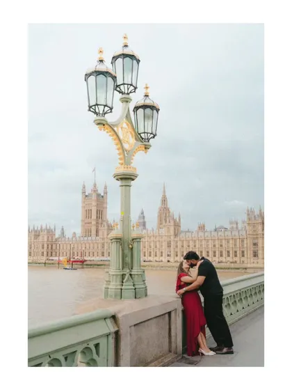 Love stories deserve a grand stage. Here, against the iconic backdrop of London's architecture, Akhil and Merlin share a kiss. This is an example of a destination couple shoot where we use the soul of a city to tell the story of two hearts becoming one.
