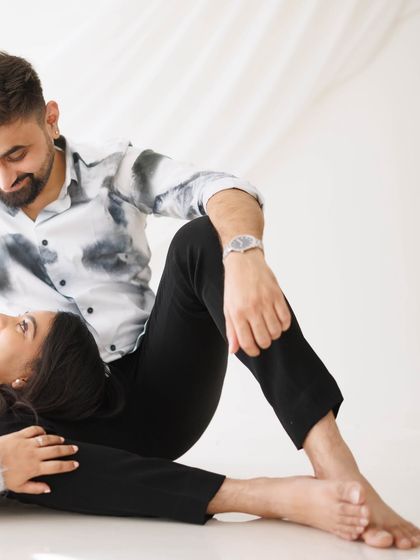 A candid and relaxed moment between a couple, filled with smiles and genuine connection. This shows the comfortable and fun atmosphere of my sessions.