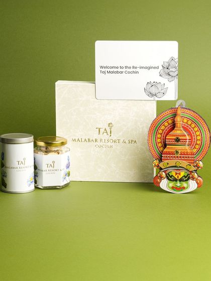 A custom Onam hamper I designed for the prestigious Taj Malabar Resort & Spa, Cochin. This elegant corporate gift features branded containers and a Kathakali decor piece, reflecting luxury and local culture.