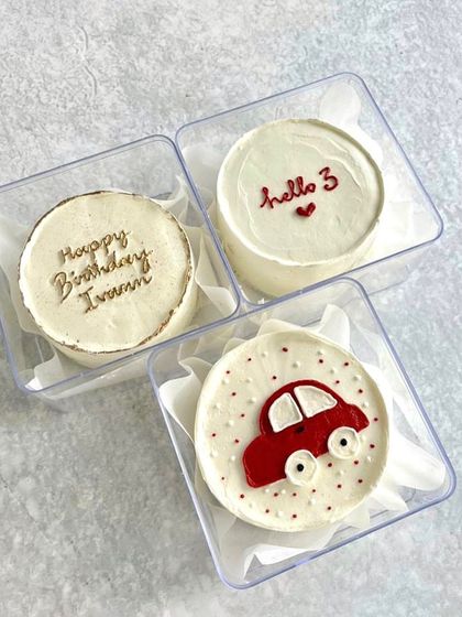 A simple and sweet set of three mini bento cakes to celebrate a 3rd birthday.