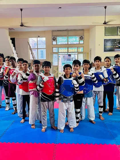 Champions in the making. This group of young fighters is ready to take on any challenge after a tough sparring session.