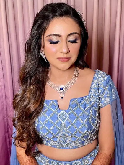 A close-up of the soft curls and braided detail.