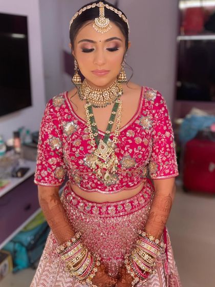 The bride looks absolutely beautiful and ready for her wedding day.