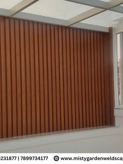 A premium WPC louver installation at NVT Orchid Garden. The wood-plastic composite material provides the look of natural wood with superior durability and weather resistance.