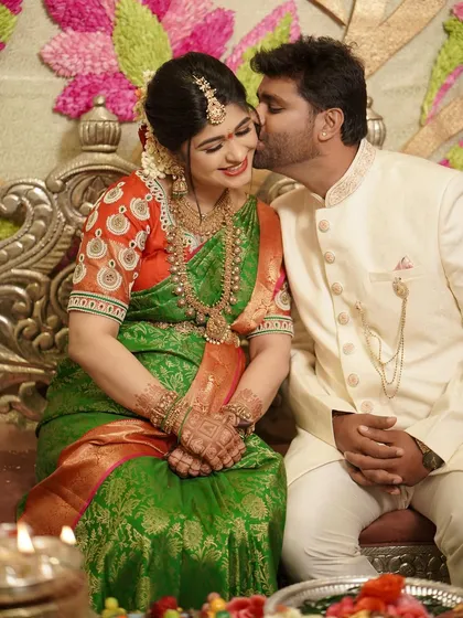 A candid, joyful moment between a couple during their traditional baby shower ceremony. Capturing genuine emotion is at the heart of what I do, preserving these fleeting feelings forever.