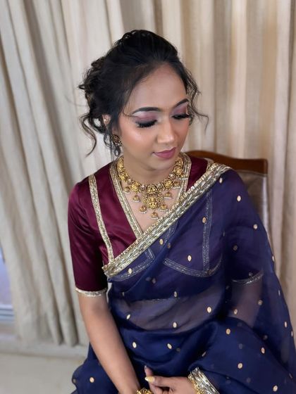 A close-up of the hairstyle, highlighting the texture and volume.