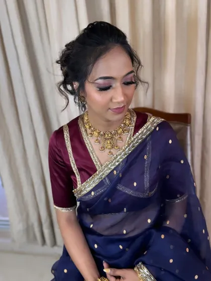 A close-up of the hairstyle, highlighting the texture and volume.