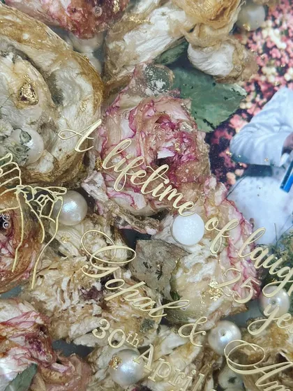 Every flower and pearl is placed with care. This close-up shows the texture and depth I try to achieve in my varmala preservation art.