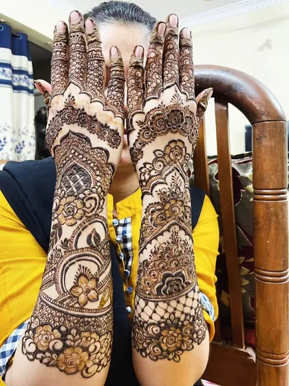 A full view of this intricate design for my brother's wedding, showing the detailed work from the elbows to the fingertips.