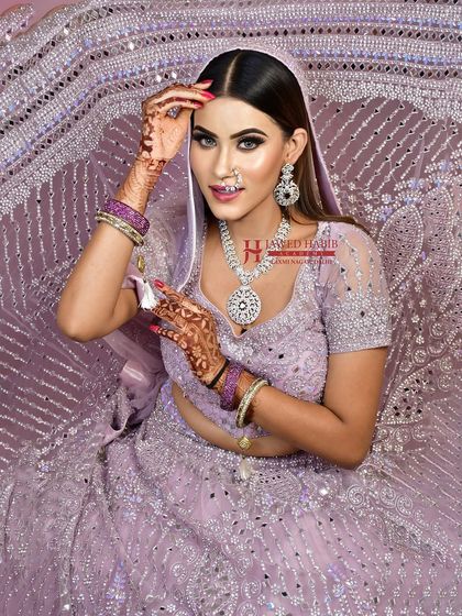 A beautiful bridal look in a soft lavender lehenga. Our courses cover a wide range of color palettes, preparing you to work with any bridal theme or preference.