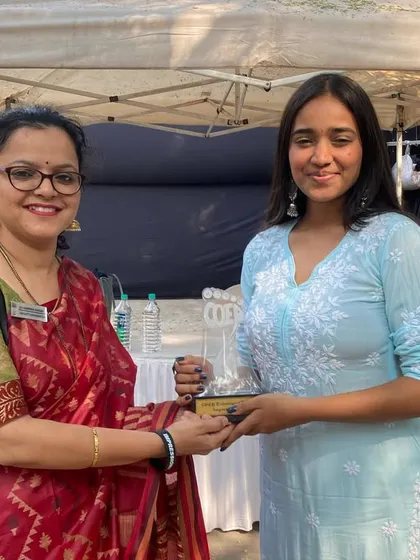 Receiving a token of appreciation for judging the mandala competition. I am always grateful for opportunities to connect with the wider art community.