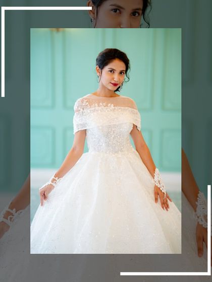 A lovely portrait of the bride in the white gown, highlighting the delicate off-shoulder neckline.