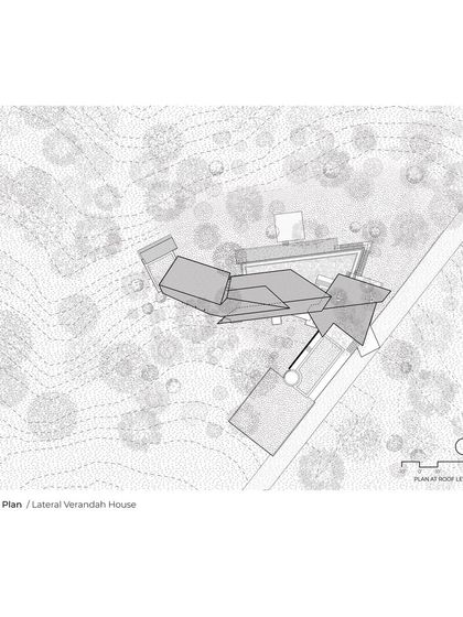 The terrace floor plan of the Lateral Verandah House, showing the dynamic, angular form of the roof. The design incorporates existing trees and shifts in geometry to provide shade and frame scenic views of the surrounding landscape.