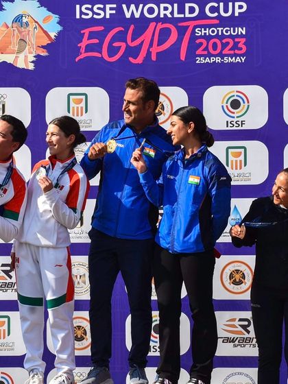 Team India's Mairaj Khan and Ganemat Sekhon celebrating their gold medal win in the Skeet Mixed Team event at the ISSF World Cup in Cairo.