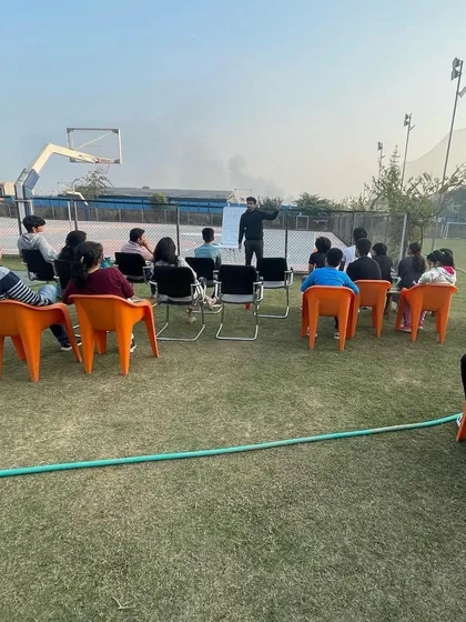 A wide view of the outdoor nutrition session, showing our use of the entire facility for different aspects of athlete development.