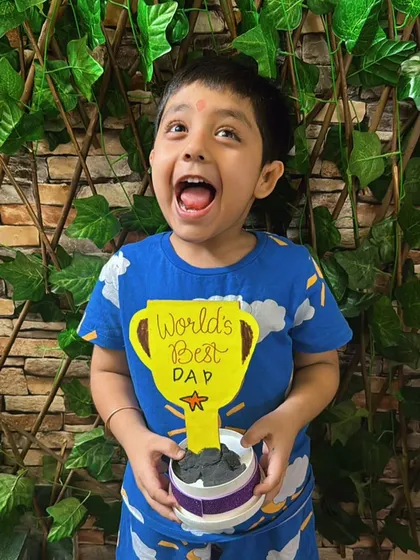 The pure joy of creating something for someone you love! This little guy is so excited about his Father's Day trophy.