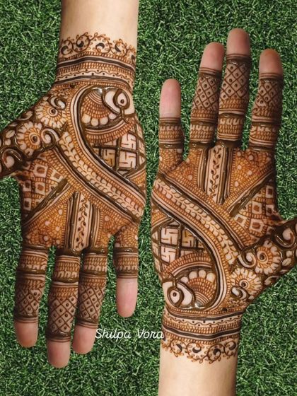 A unique design with a diagonal flow, featuring auspicious swastika symbols and fish motifs.