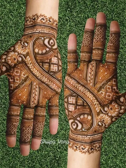 A unique design with a diagonal flow, featuring auspicious swastika symbols and fish motifs.