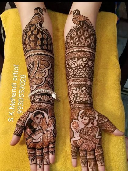 A beautiful design featuring the bride and groom on the palms. The arms are decorated with large, elegant peacock motifs.