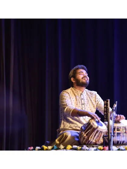 A moment of complete immersion in music during a concert in Kolkata. For me, playing the tabla is a form of sadhana, a spiritual practice where the world fades away and only the rhythm remains.