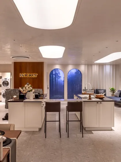 An overview of the Delhi showroom, showing the spacious layout and variety of kitchen styles on display, from classic to contemporary.
