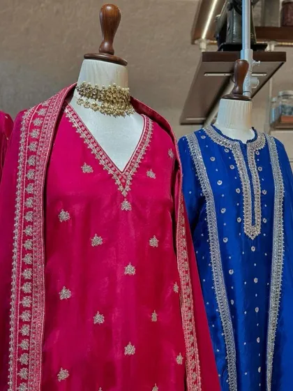 Another view of the pink and blue kurtas, highlighting the different necklines and embroidery patterns available in this color story.