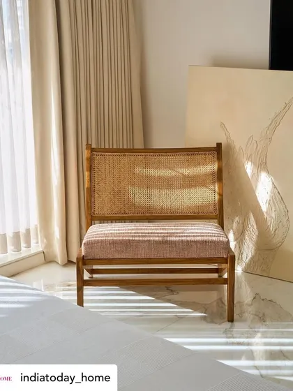 A closer look at the beautiful cane and wood armchair from our 'House on the Hill' project feature. This piece exemplifies our love for natural materials and timeless furniture design.