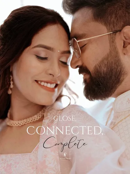Close, connected, complete. This intimate, high-key portrait focuses on the pure emotion and connection between two people, shutting out the world to highlight their bond.