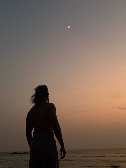 A moment of contemplation by the sea at dusk. I came seeking quiet, but the waves spoke loudly. Sometimes truth hits harder when you are alone, away from the crowd.