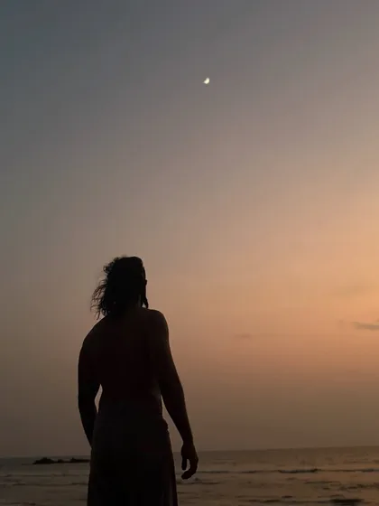 A moment of contemplation by the sea at dusk. I came seeking quiet, but the waves spoke loudly. Sometimes truth hits harder when you are alone, away from the crowd.
