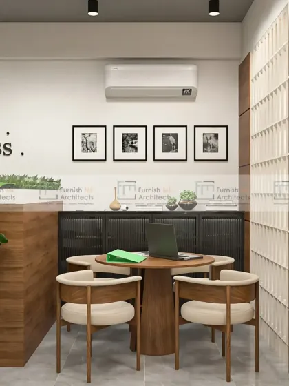 A cozy discussion nook within a larger office, featuring warm wood tones and comfortable seating. This space is perfect for informal team meetings or a quiet break.