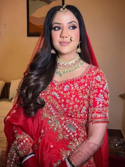 Another angle of this blushing bride. Her makeup is designed to look flawless from every angle and last all night long, no matter how much she dances.