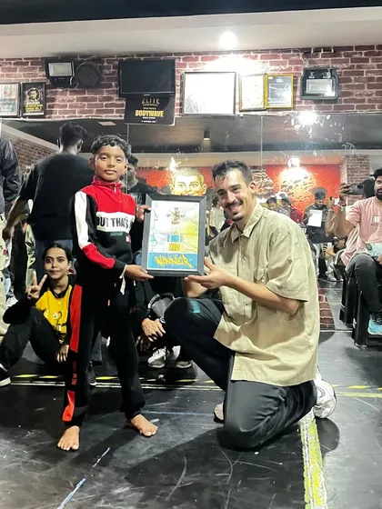 We're building the future of the scene. Here is the winner of our Kids Under 12 1v1 battle receiving his award from the judge. Our events provide a platform for the next generation of breakers to test their skills.