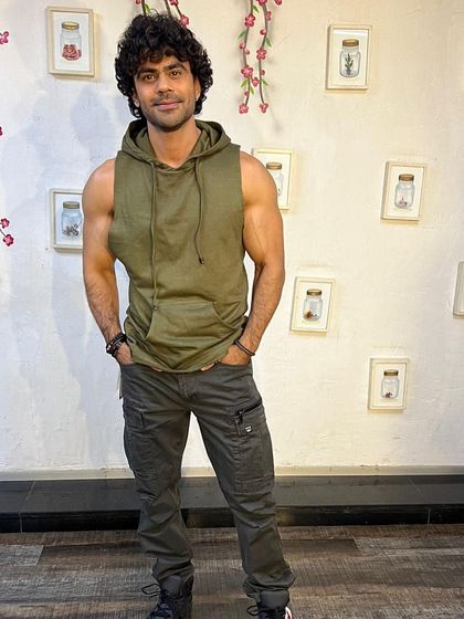 A casual shot of my dear friend Ankitt Mohan. I styled him in this relaxed, athletic look with a sleeveless hoodie and cargo pants.