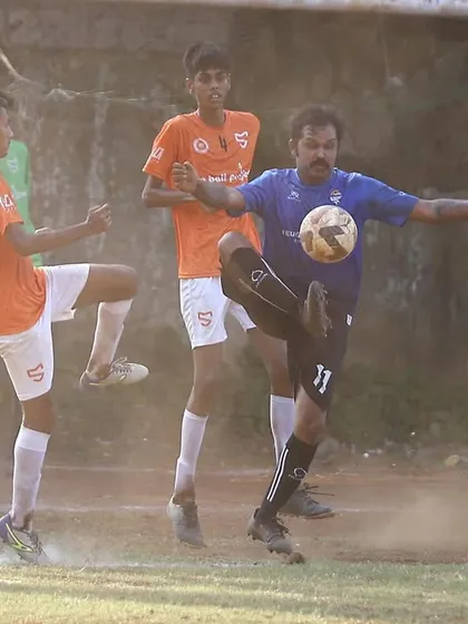 An acrobatic volley attempt during the MFA Third Division game.