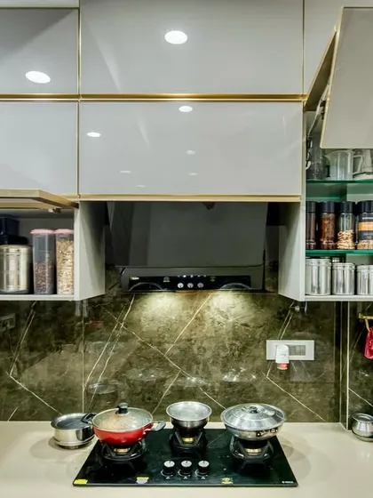 Lift-up cabinets with glass shelves, providing both storage and display space.