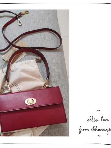 Another view of the customized Ellie wallet in Cranberry red. You can see both the long crossbody sling and the added shorter shoulder handle, giving her multiple options for carrying this elegant piece.