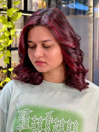Another angle of the pretty red hair, showing off the dimension and shine.