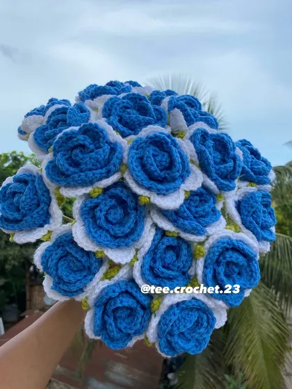 A vibrant bouquet of blue and white roses.
