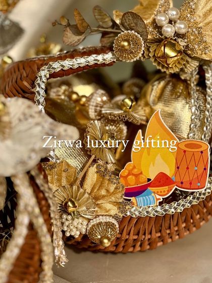 A close-up of the intricate decorations on my Lohri gift basket. The golden flowers, pearls, and bells all contribute to a rich and festive look.