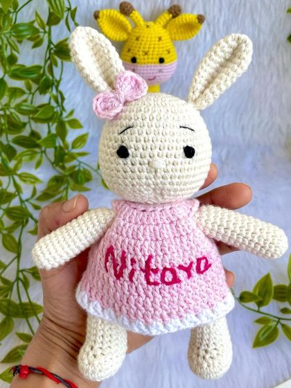 A classic duo, the giraffe and the bunny! This bunny is personalized with the name "Nitaya" on her pink dress. These make a wonderful gift set for a new baby.