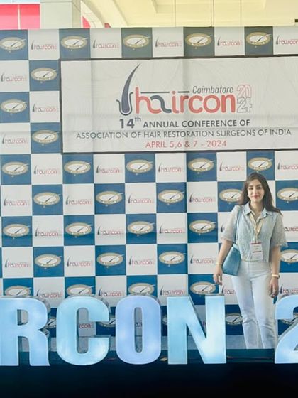 At the Haircon 2024 conference. My involvement in these events ensures that I bring the most current knowledge and techniques back to my patients.