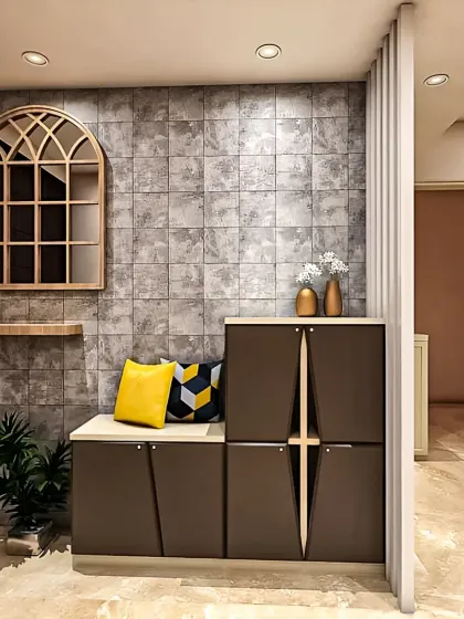 A modern shoe rack and entryway bench combination. The unit features unique geometric door designs and provides both seating and concealed storage to keep your foyer tidy.