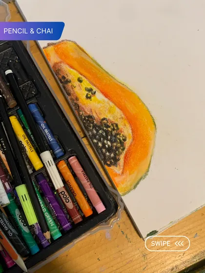 A student's work in oil pastels, capturing the rich colors and texture of a sliced papaya. Our pastel workshops are a great way to get a feel for this expressive medium.