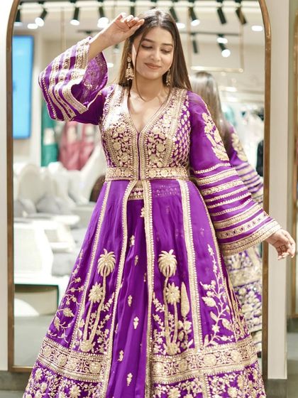 Another look at this stunning purple Anarkali, perfect for a royal statement.